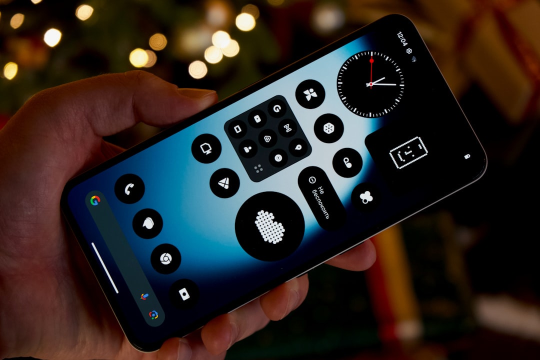 A hand holding a smartphone with an abstract interface — the surface where an assistant renders 'open now' or 'closed'