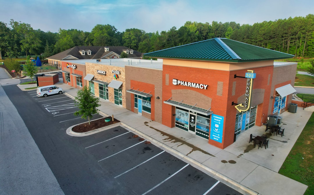 A storefront and its parking lot from above: one real place an engine has to reassemble from scattered records
