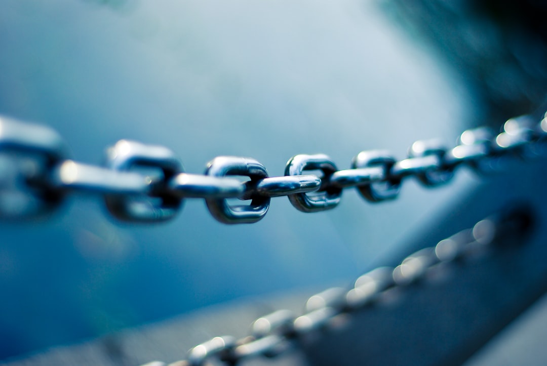 Lines and nodes on a blue field: a dependency chain, where one broken link invalidates everything downstream