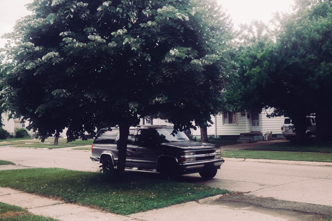 A service van parked on a suburban street: the business is the van, not the address it parks at